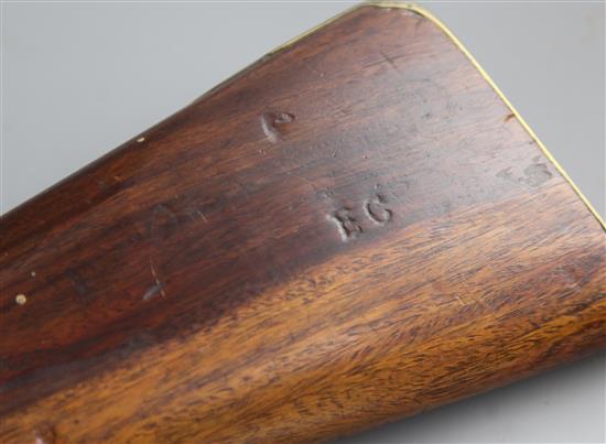 A late 18th century flintlock blunderbuss with sprung bayonet and brass barrel, 29in.